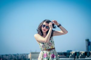 Portrait of young woman wearing sunglasses