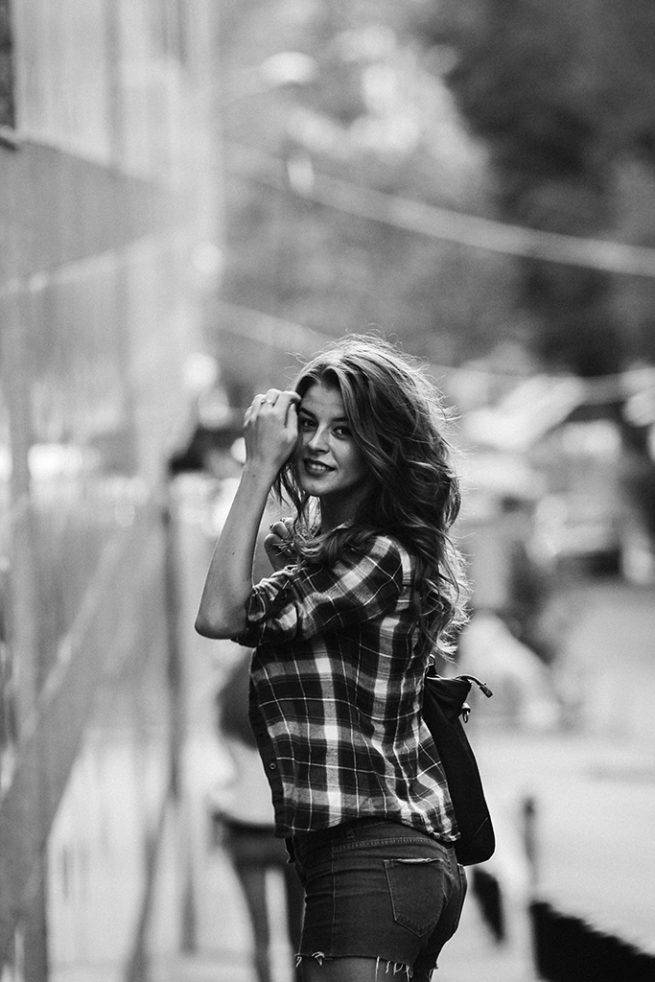 Portrait of young woman outdoors black&white